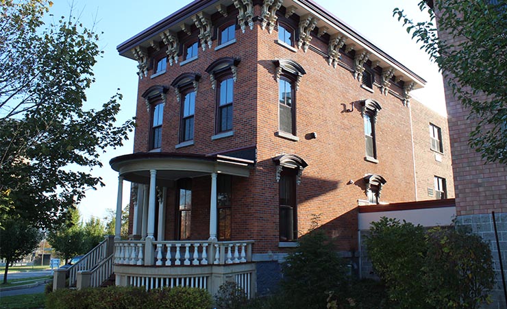 The exterior of the Enriched Living Center at the Rescue Mission of Utica in New York